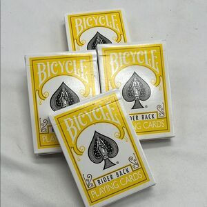 Four Decks of Yellow Bicycle Playing Cards